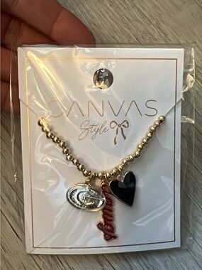 Georgia Gold toned Beaded Necklace with Black Heart and Red Script Charm